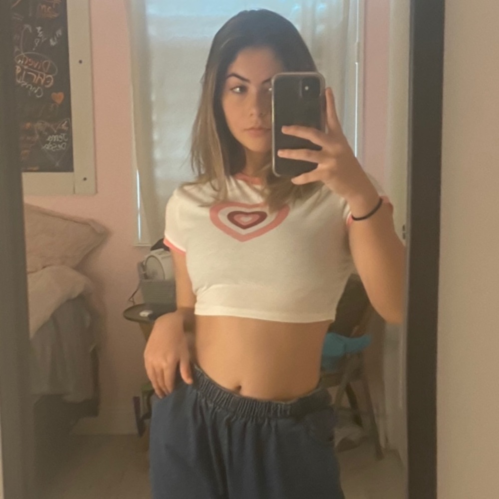 a rare cropped pink heart shirt